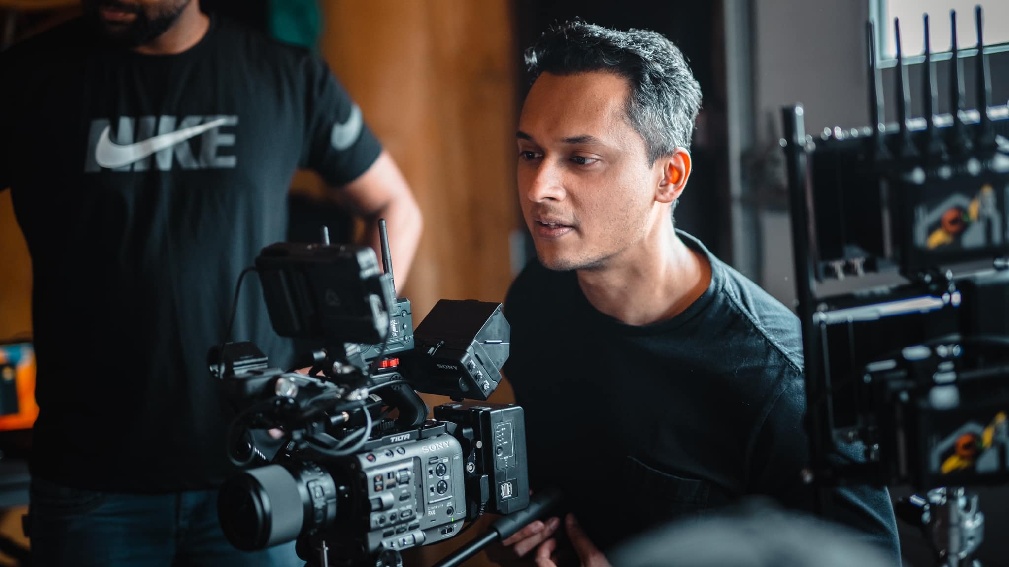 Clint operating a camera